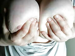 Squeezing my big tits