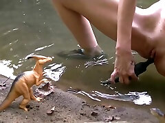 Willamina Plays With Dinosaurs Toys At The Creek
