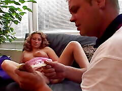 Outstanding blonde lady from Germany pleasing her man on the couch